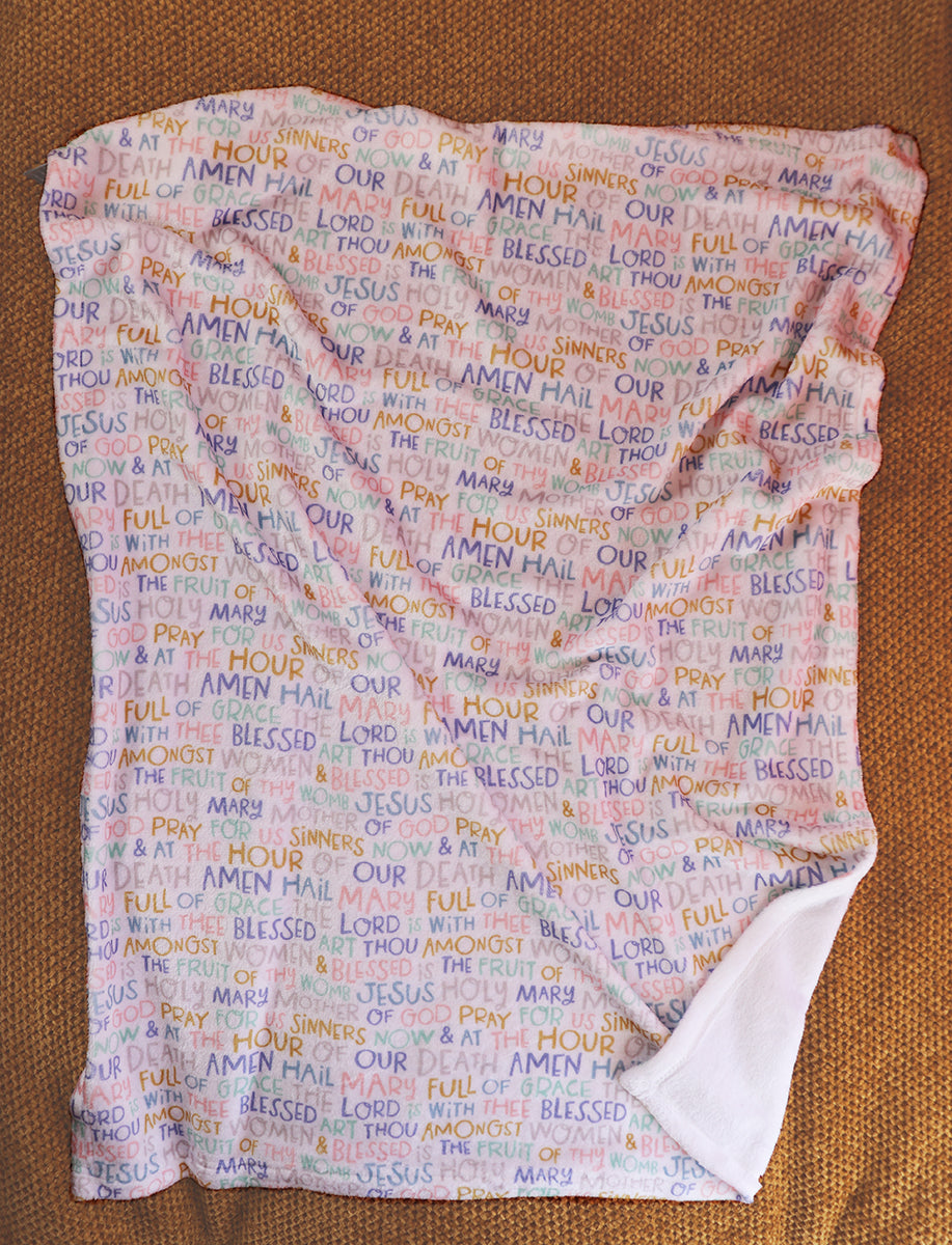 Hail Mary prayer Catholic baby blanket in white.